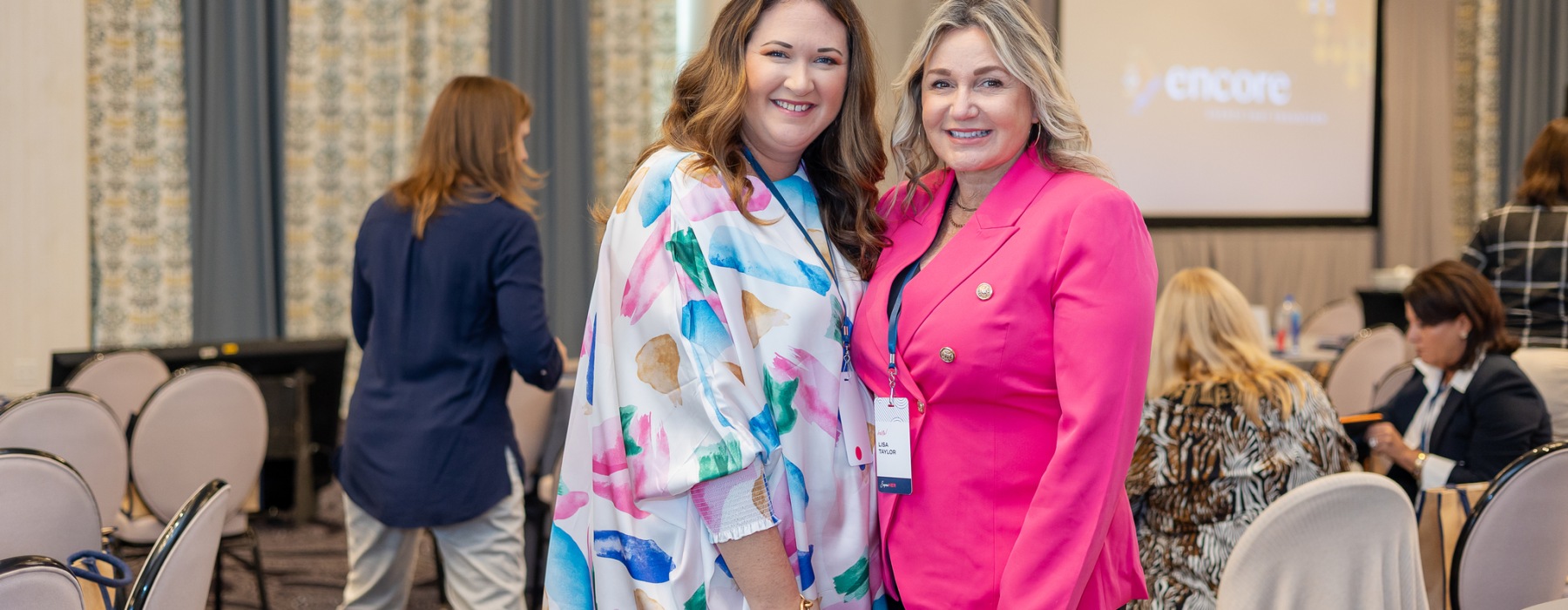 two women in a bright room